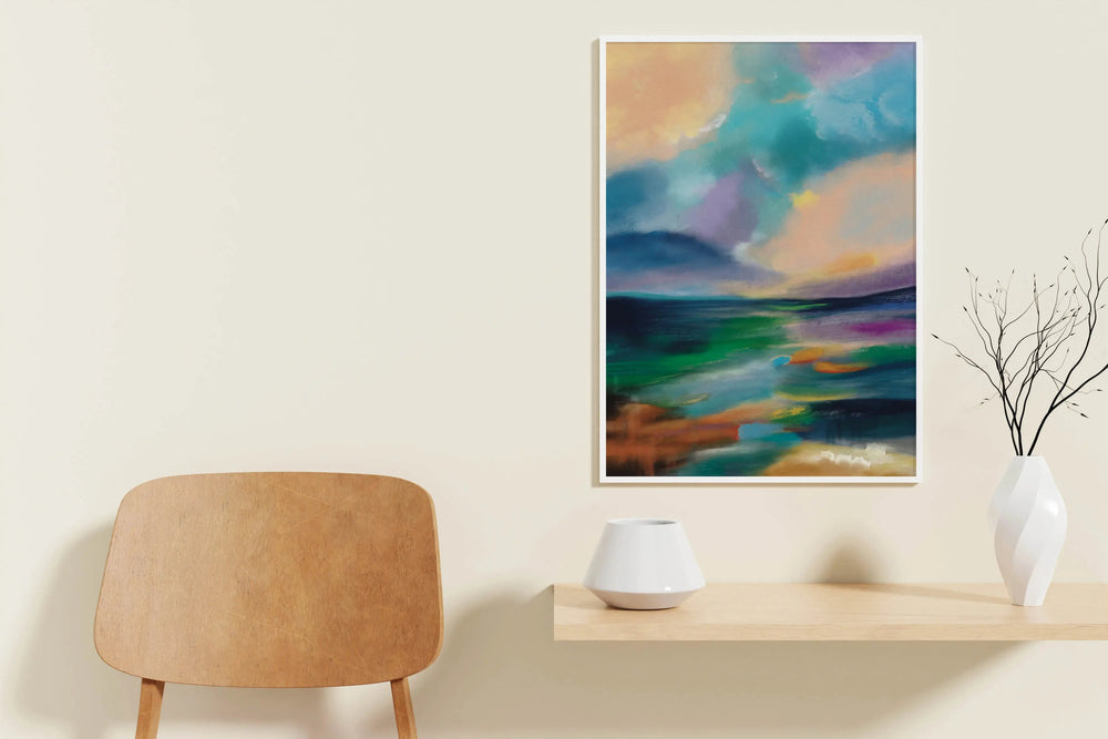 a painting hanging on a wall next to a chair