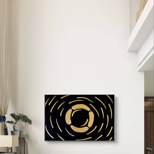 Gold and black abstract textured painting hung in a high-ceilinged living space with minimalist decor.
