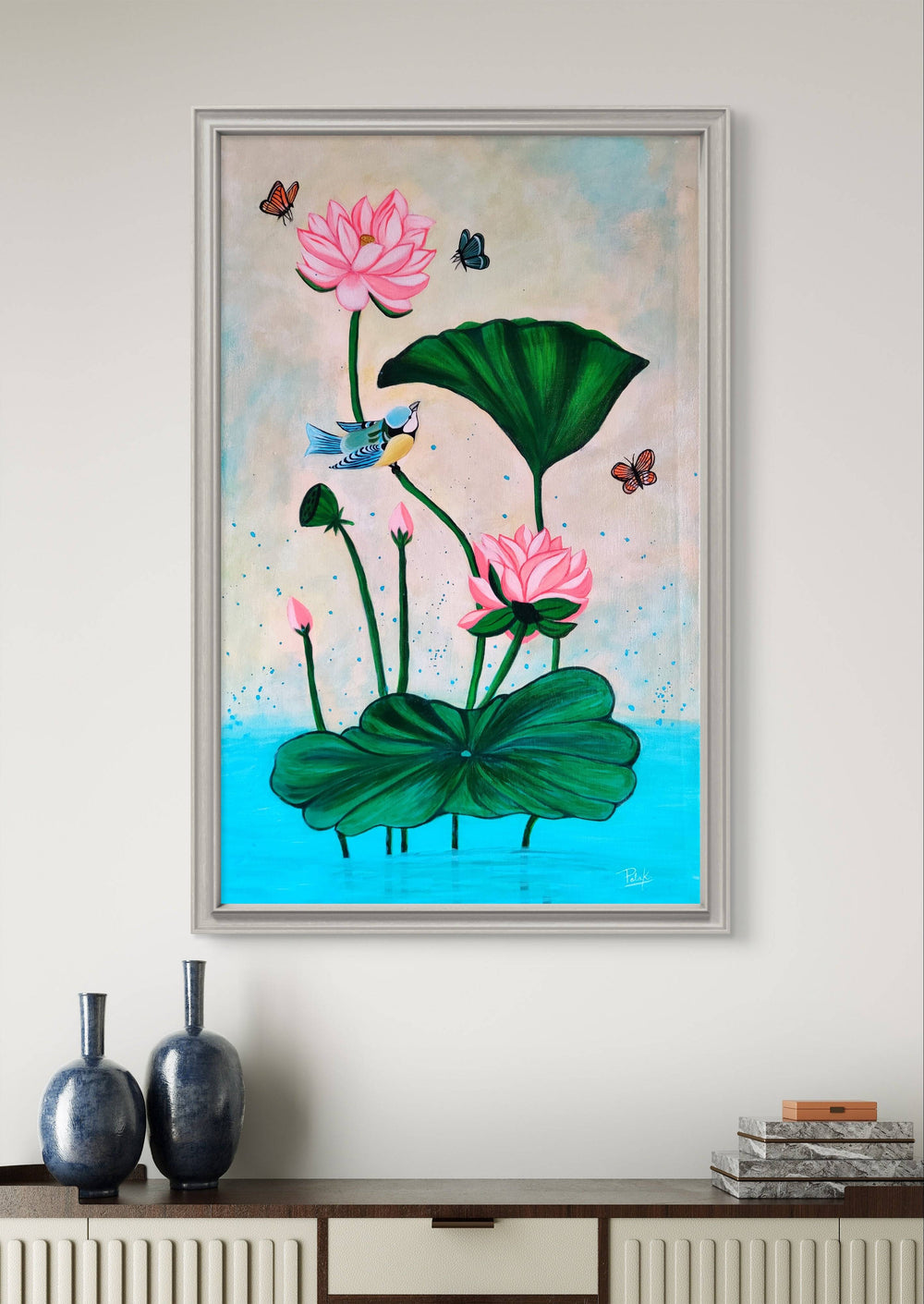 Nature-inspired Pichwai lotus painting on a minimalist sideboard in a modern home.