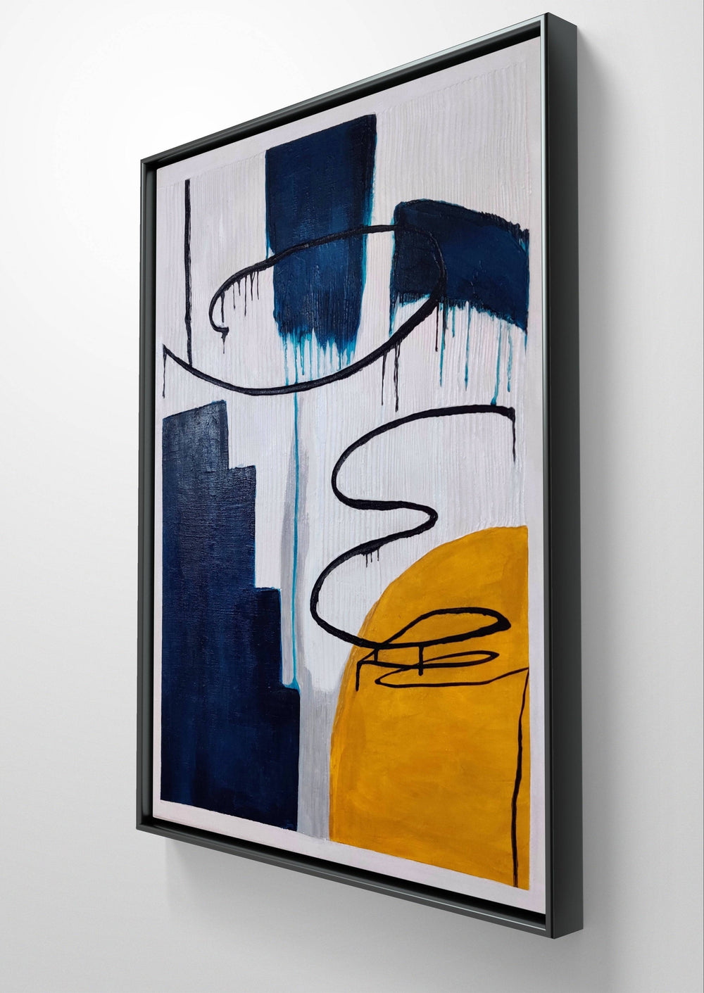 Close-up of a modern abstract painting with textured blue, yellow, and black details in a black frame.