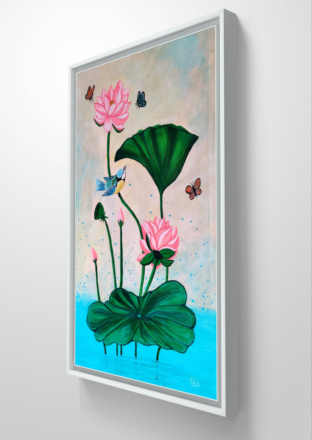 Close-up of a Pichwai acrylic painting of lotus flowers and birds in a white frame.