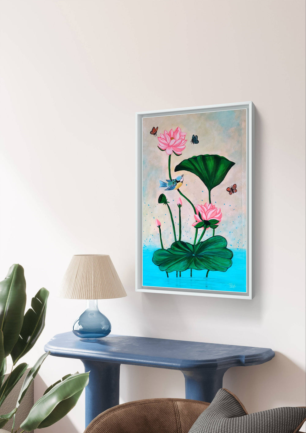 Handmade Pichwai lotus painting with vibrant colors on a modern console table.