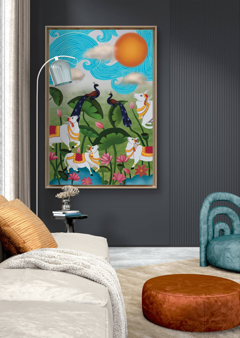 Colorful Pichwai garden artwork with cows and peacocks in a modern, dark-toned living space.