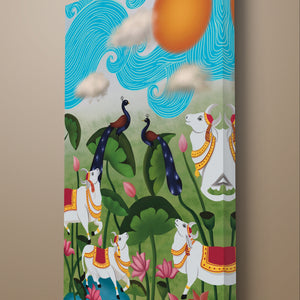 Side view of vibrant Pichwai artwork showcasing intricate details of cows and peacocks.